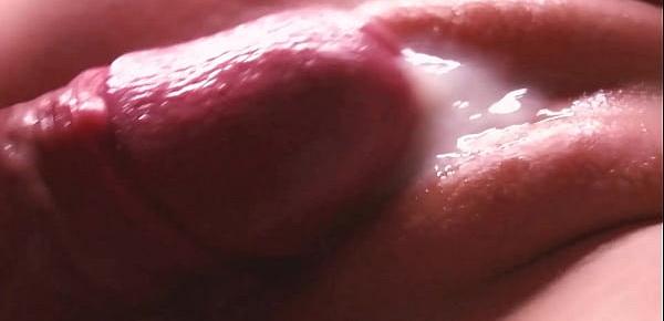  cum between her labia. Close-up